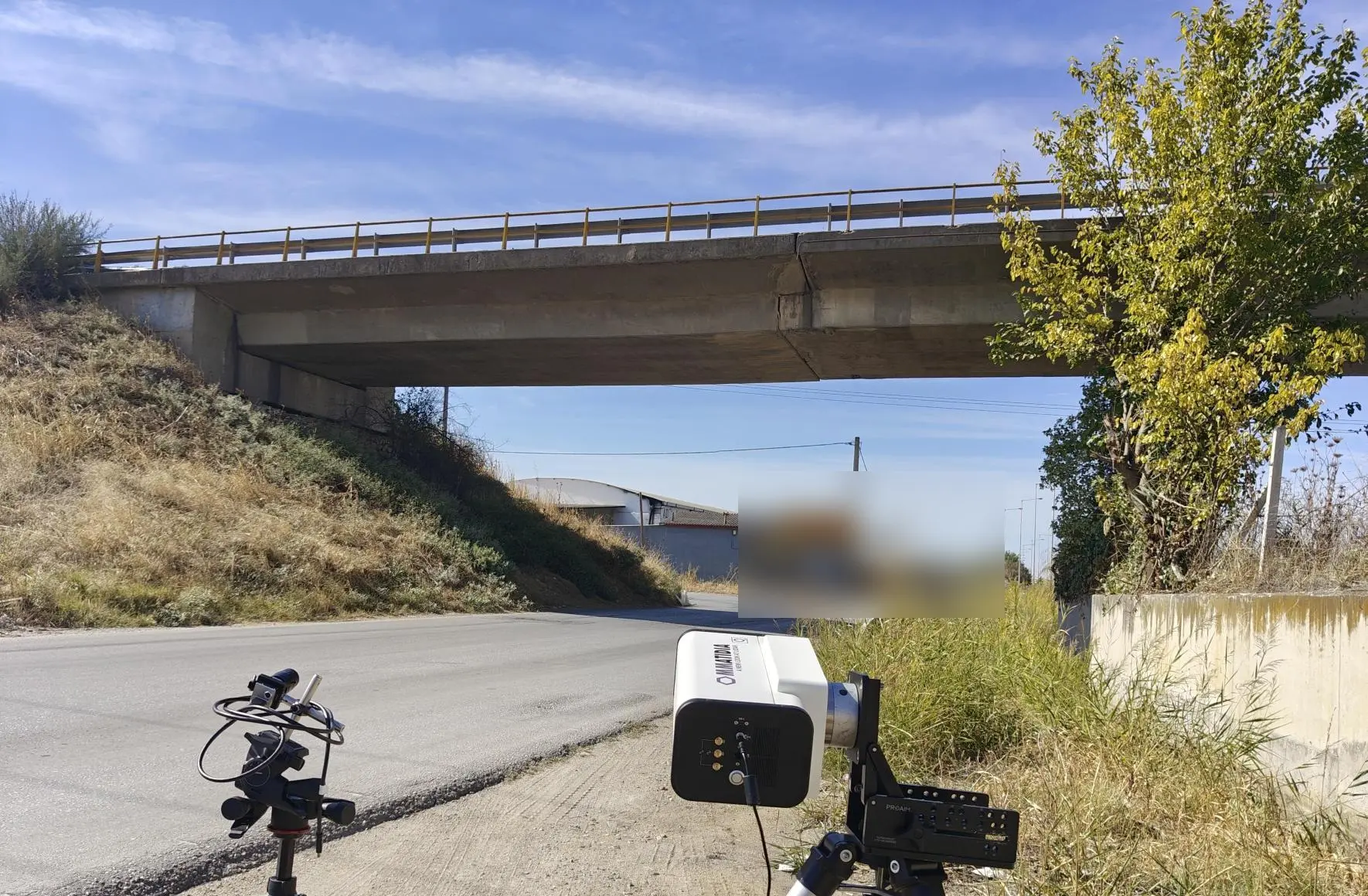 Ommatidia Q2 laser radar positioned on a roadside to measure an A1 motorway bridge near Thessaloniki